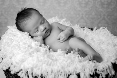 B&W Baby Girl on fluffy white throw blanket